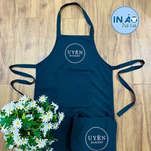 Tạp dề Uyên Bakery màu xanh than phối dây