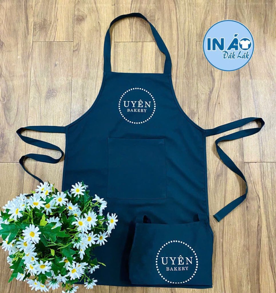 Tạp dề Uyên Bakery màu xanh than phối dây
